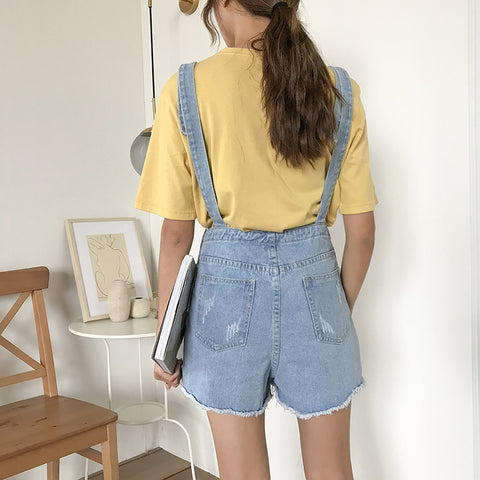 dos ouvert de la salopette short en jean pour femme